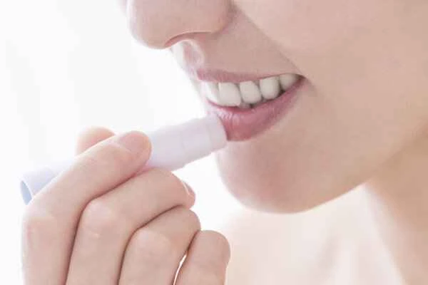 What ointment should I use for cheilitis after applying lipstick?