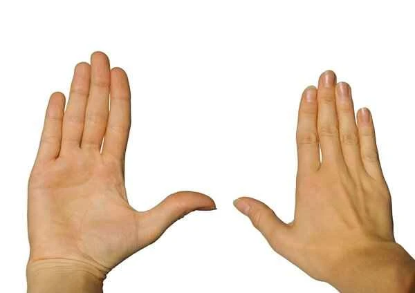 Hardened and blackened skin appeared on the knuckles of the back of the hand.